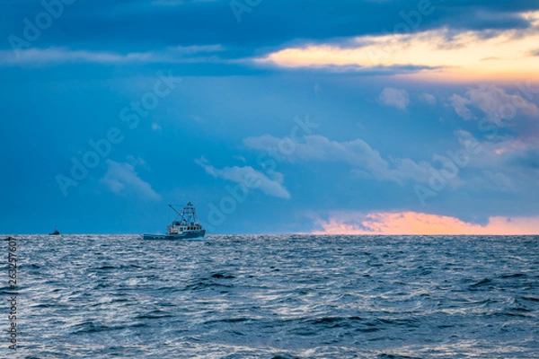 Obraz Lobster fishing boat scenery of Canada's Atlantic coast with a beautiful sky.