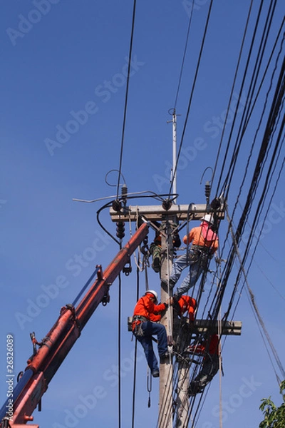 Obraz Electrician stays on the tower