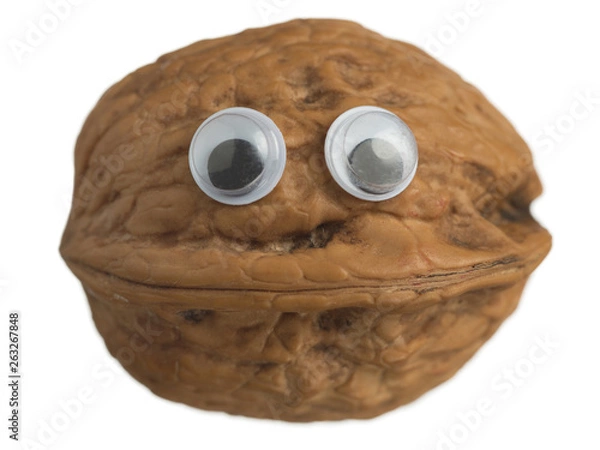 Obraz Whole walnut funny smile face with eyes isolated on white background. Food photography