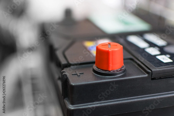 Fototapeta car battery with positive red contact for the repair of the machine