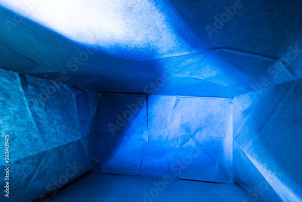 Obraz Abstract blue background with paper bag