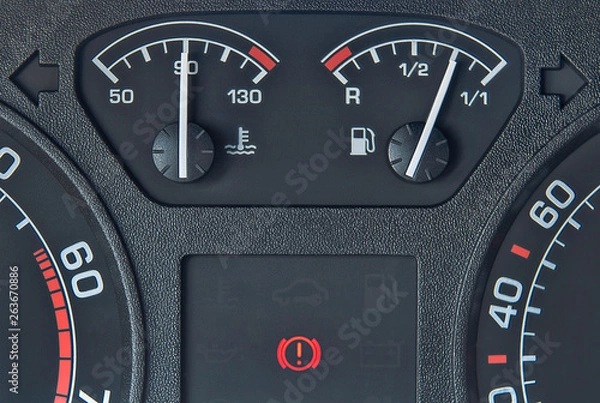 Fototapeta Сar dashboard with fuel gauges and engine temperature gauges