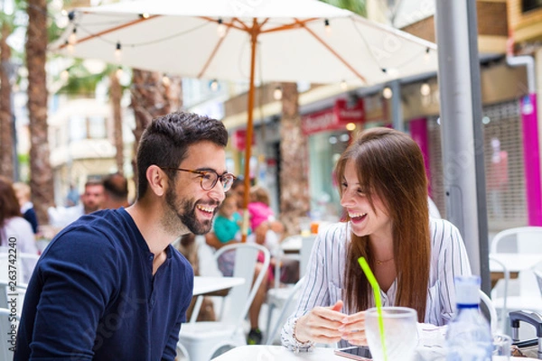 Fototapeta two friends talking in te bar