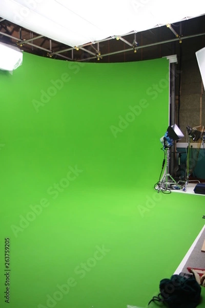 Fototapeta An empty green screen visual effects studio