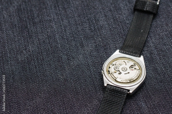 Obraz Closeup machine watch using as a background or wallpaper