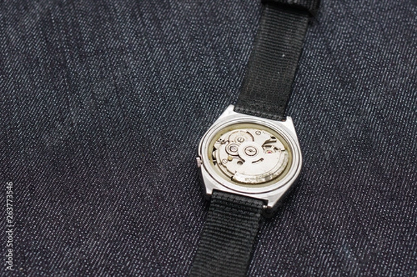 Obraz Closeup machine watch using as a background or wallpaper