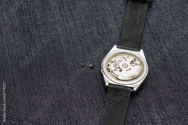 Obraz Closeup machine watch using as a background or wallpaper