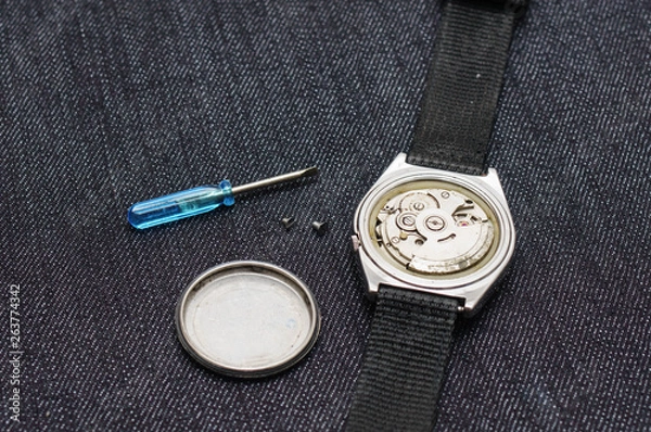 Obraz Closeup machine watch using as a background or wallpaper