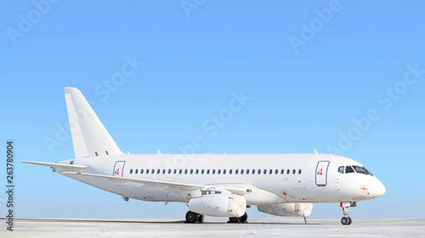 Fototapeta modern airplane parked on airport runway isolated on blue sky background side view of white jet engine passenger aircraft preserved on apron with plane parts gear engine intake air sensors secured