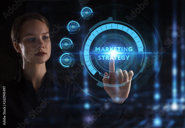 Fototapeta The concept of business, technology, the Internet and the network. A young entrepreneur working on a virtual screen of the future and sees the inscription: marketing strategy