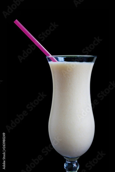 Obraz Pineapple smoothie isolated on black background
