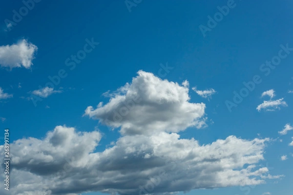 Obraz blue sky with white clouds