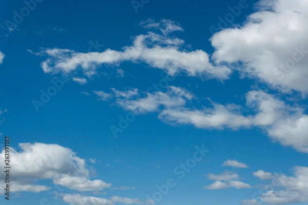 Obraz blue sky with white clouds