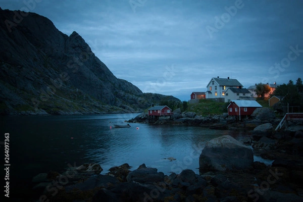 Fototapeta A moody fishing village at dusk on Lofoten Island, above the arctic cirle in Norway