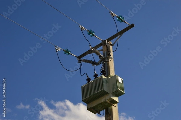 Fototapeta A current transformer on a power pole