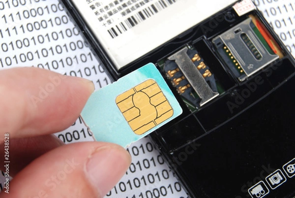 Fototapeta sim card with cellphone