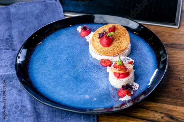 Obraz Yogurt and white chocolate mousse with raspberry cream. French cuisine. The work of a professional chef. Dish from a restaurant or cafe menu. Close-up