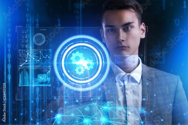 Fototapeta The concept of business, technology, the Internet and the network. A young entrepreneur working on a virtual screen of the future and sees the inscription: