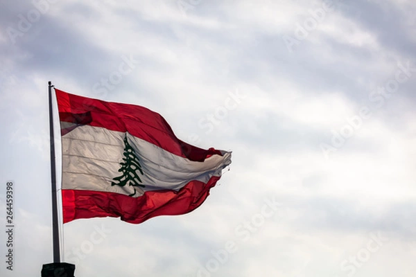 Fototapeta The Lebanese flag flying over Beirut, Lebanon in Spring