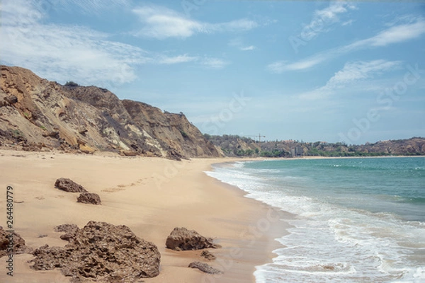 Obraz Beautiful sea cost view. Atlantic ocean costline, sandy beach Sangano, Angola under sunlight in summer sunny day