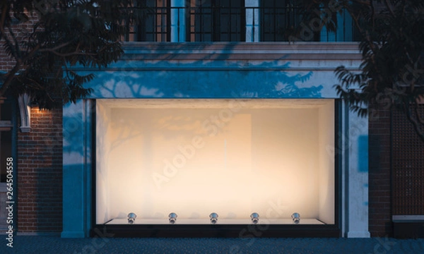 Fototapeta Empty illuminated storefront. night time. 3d rendering. Copy space. Empty space.