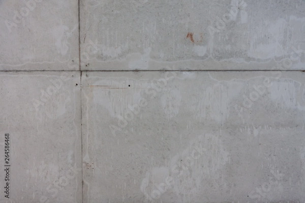 Fototapeta Texture of gray smooth cement slab with seam