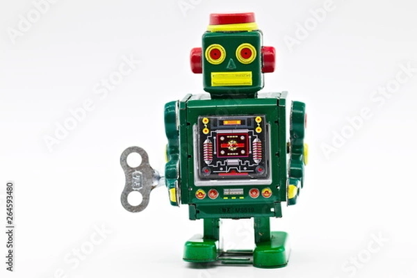 Obraz Green vintage old wind up toy robot isolated on white limbo background