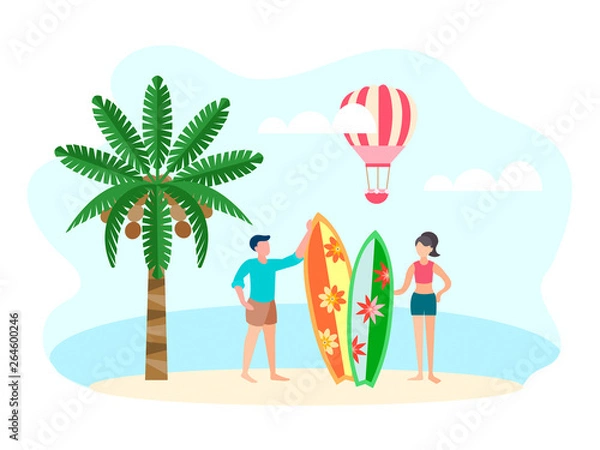 Obraz Young couple of vacationing surfers on the beach on the ocean coast