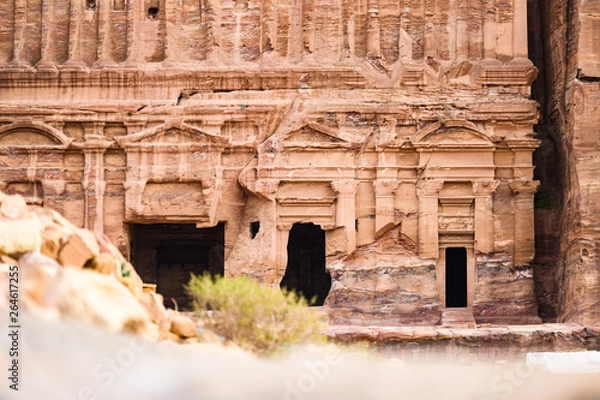 Fototapeta (selective focus) Amazing view of the beautiful Petra site with beautiful temples carved into the rock. Petra is a Unesco World heritage site, historical and archaeological city in southern Jordan.