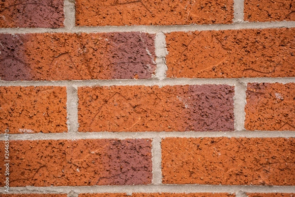 Fototapeta brick wall. Facture of new brown bricks on the wall. close up