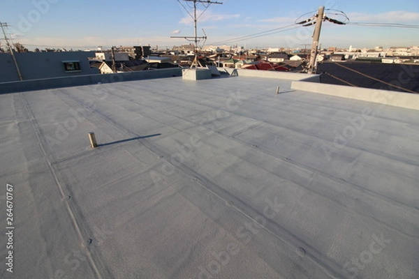 Obraz 夕暮れ時のマンションの屋上防水