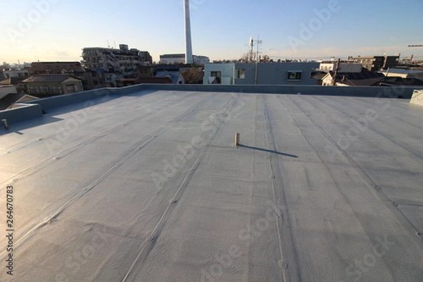 Obraz 夕暮れ時のマンションの屋上防水