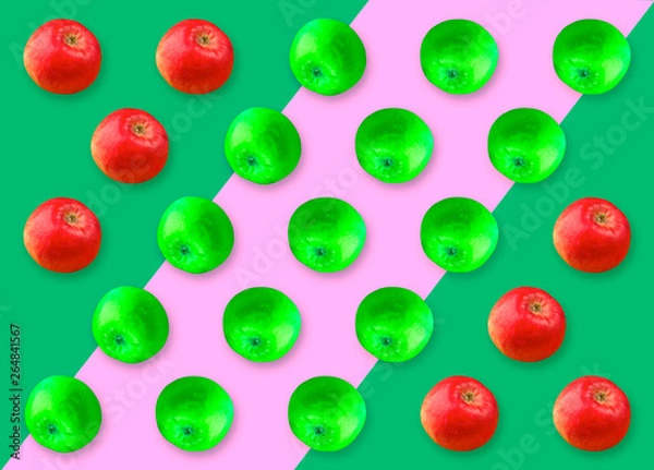 Fototapeta Colorful pattern of red and green apple. green and pink background