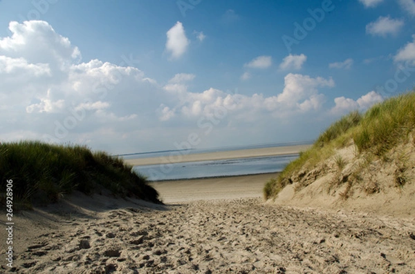 Obraz sand way to the North sea beach and beautiful sky, north sea, island langeoog