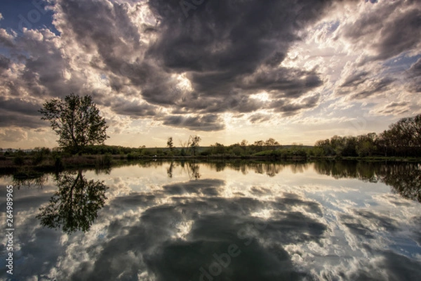 Obraz Reflections on the lake water.