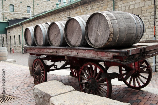 Obraz Barrels on the wagon wheel