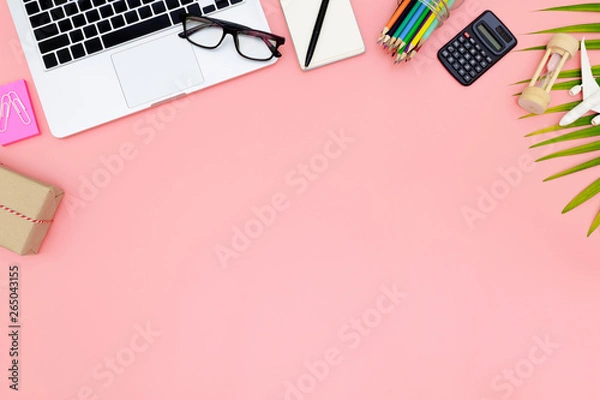 Fototapeta Flat lay office workspace with blank laptop, clipboard, top view laptop background and copy space on pink background, Above view shot of laptop background, Laptop background