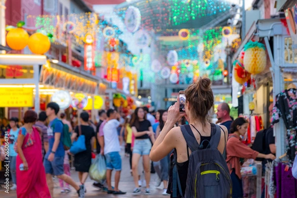 Fototapeta 2019 March 1st, Singapore, Chinatown - People walking and shopping on the street market after sunset.