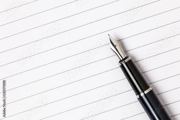 Fototapeta Top view. Blank notepad with pen