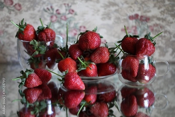 Fototapeta Ripe red strawberries lying on the table