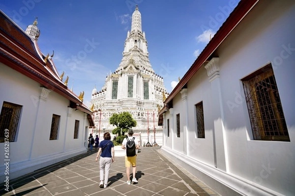 Fototapeta Many beautiful chedi at wat arun as a famous landmark in Bangkok, Thailand