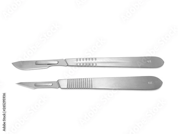 Fototapeta Clipping path of stainless steel scalpel handle with sharpen blade in surgical equipment isolated on white background