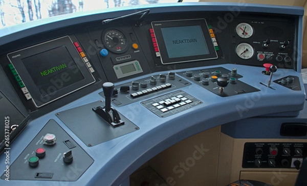 Obraz Inside look at modern train driver cabin