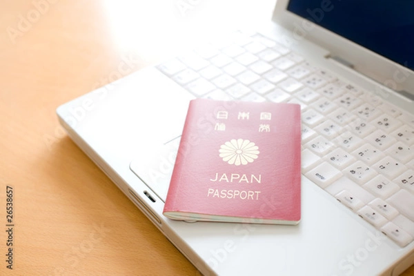 Fototapeta ノートパソコンとパスポート