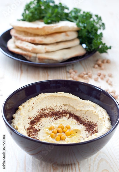 Obraz Hummus served with pita bread
