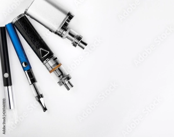 Fototapeta electronic cigarettes or vaping devices on white background