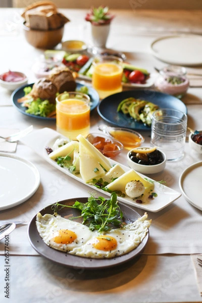 Fototapeta Turkish breakfast with various plates on a table