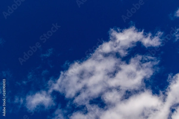 Fototapeta Clouds against blue sky as background