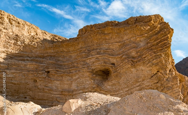 Fototapeta a bizarre layered geological rock formation in wadi shlomo in the eilat mountains about northwest of eilat in Israel