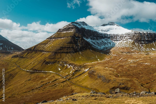 Obraz View of the snow-covered peak of Slættaratindur, the highest mountain on the Faroe Islands during a sunny spring day (Faroe Islands, Denmark, Europe)